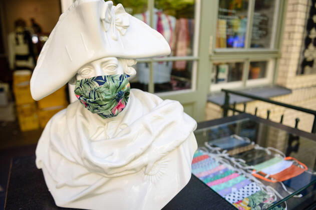 April 20, 2020: A Prussian bust with a mouth guard next to a showcase can be seen in front of the manufacture of the Luxury Tie Auerbach in the Hackesche HoÂ¶fe in Berlin Mitte. The company produces mouth-nose-masks made of noble fabrics, partly matching ties or bow ties. - ZUMAs172 20200420_zap_s172_034 Copyright: xJanxScheunertx