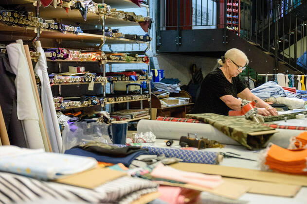 April 20, 2020: Chef Directrice DAGMAR HARTMANN can be seen during the process of making a mask in the manufacture of the Luxury Tie Auerbach in the Hackesche HoÂ¶fe in Berlin Mitte. The company produces mouth-nose-masks made of noble fabrics, partly matching ties or bow ties. - ZUMAs172 20200420_zap_s172_039 Copyright: xJanxScheunertx