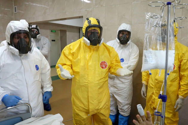 GROZNY, RUSSIA - APRIL 20, 2020: Chechnya Head Ramzan Kadyrov (C) in a chemical protection suit during a visit to Grozny s clinical hospital No 4 treating coronavirus patients. As of 20 April 2020, the Chechen Republic has registered 219 COVID-19 cases with 23 recoveries and 5 deaths. Video screen grab Grozny TV Channel TASS  TS0D674E