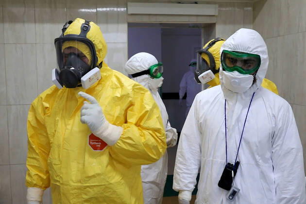 GROZNY, RUSSIA - APRIL 20, 2020: Chechnya Head Ramzan Kadyrov (L) in a chemical protection suit during a visit to Grozny s clinical hospital No 4 treating coronavirus patients. As of 20 April 2020, the Chechen Republic has registered 219 COVID-19 cases with 23 recoveries and 5 deaths. Video screen grab Grozny TV Channel TASS  TS0D674F