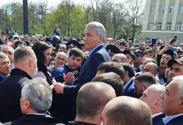 VLADIKAVKAZ, RUSSIA - APRIL 20, 2020: Vyacheslav Bitarov (C), Head of North Ossetia-Alania, addresses participants in a rally against the self-isolation order, in Svobody Square in front of the Palace of Justice. Non-working period was expanded in the Republic of North Ossetia till April 30, 2020 to prevent the spread of the novel coronavirus. Elina Sugarova TASS  TS0D6776