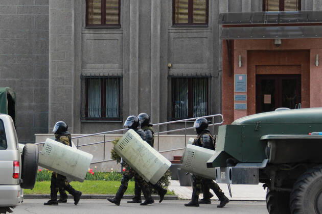 VLADIKAVKAZ, RUSSIA - APRIL 20, 2020: Riot police officers carry shields during a rally against the self-isolation order, in Svobody Square in front of the Palace of Justice. Non-working period was expanded in the Republic of North Ossetia till April 30, 2020 to prevent the spread of the novel coronavirus. Olga Smolskaya TASS  TS0D67B4