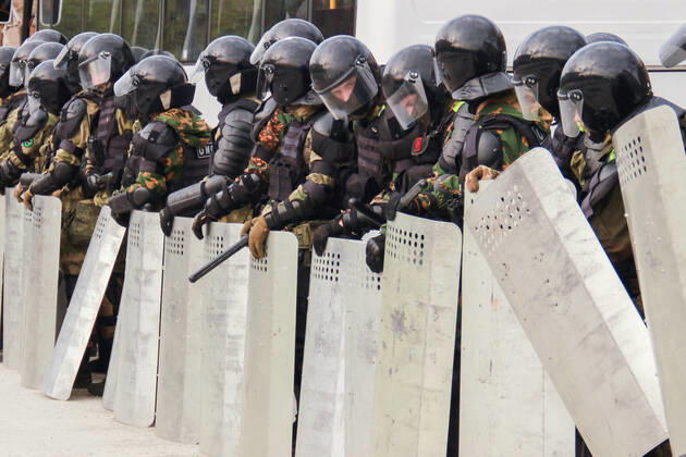 VLADIKAVKAZ, RUSSIA - APRIL 20, 2020: Riot police officers line up during a rally against the self-isolation order, in Svobody Square in front of the Palace of Justice. Non-working period was expanded in the Republic of North Ossetia till April 30, 2020 to prevent the spread of the novel coronavirus. Olga Smolskaya TASS  TS0D67BD