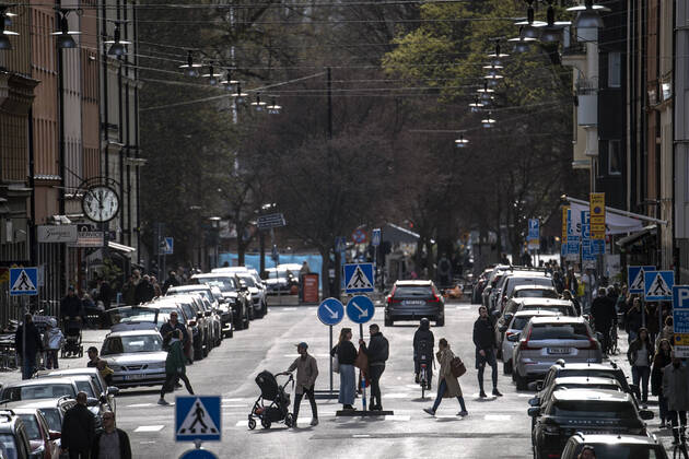 People stroll, amid the coronavirus disease COVID 19 outbreak, , in a street in central Stockholm, Sweden, on April 20, 2020 Stockholm SWEDEN x10040x,  Copyright: xAndersxWiklund TTx SWEDEN DAILY LIFE CORONA