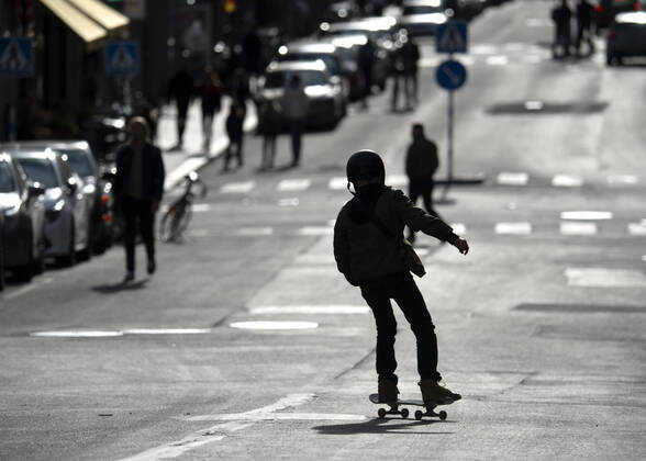 A child skates on a skateboard, amid the coronavirus disease COVID 19 outbreak, in a street in central Stockholm, Sweden, on April 20, 2020 Stockholm SWEDEN x10040x,  Copyright: xAndersxWiklund TTx SWEDEN DAILY LIFE CORONA