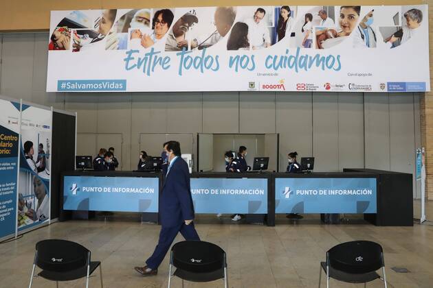 A man walks on a pavillion converted on a transitory hospital due the coronavirus crisis, in Bogota, Colombia, 20 April 2020. Corferias, the major ferial centre of Colombia, will works as Transitory Hospital Centre to receiving patients diferent to COVID-19 disease as measure to support the medical system during the coronavirus pandemic. Open transitory hospital in Bogota !ACHTUNG: NUR REDAKTIONELLE NUTZUNG!  Copyright: xCarlosxOrtegax AME4038 20200420-637230113893595514