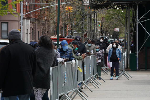 April 20, 2020, New York, NY, USA: People wait on line for a COVID-19 test at NYC Health+ Hospitals Sydenham in Harlem on April 20, 2020 in New York. New York USA - ZUMAb148 20200420_zap_b148_014 Copyright: xBryanxSmithx