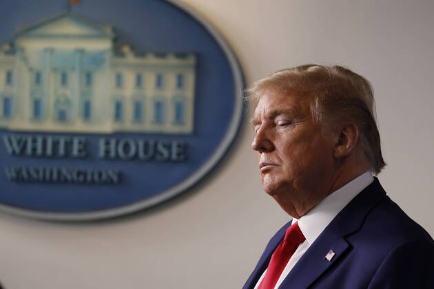 April 20, 2020, Washington, District of Columbia, USA: United States President Donald J. Trump listens during a news conference at the White House in Washington D.C., U.S. on Monday, April 20, 2020. .Credit: Pool via CNP Washington USA - ZUMAs152 20200420_zaa_s152_015 Copyright: xTasosxKatopodisx