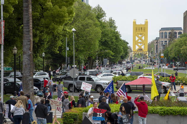 April 20, 2020, Sacramento, CA, USA: Demonstrators converged on the California Capitol in Sacramento on Monday, April 20, 2020, to protest the state s stay-at-home orders to slow the spread of the coronavirus. Sacramento USA - ZUMAj89_ 20200420_zaf_j89_006 Copyright: xPaulxKitagakixJr.x