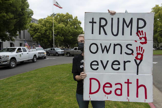 April 20, 2020, Sacramento, CA, USA: Demonstrators converged on the California Capitol in Sacramento on Monday, April 20, 2020, to protest the state s stay-at-home orders to slow the spread of the coronavirus. Sacramento USA - ZUMAj89_ 20200420_zaf_j89_016 Copyright: xPaulxKitagakixJr.x