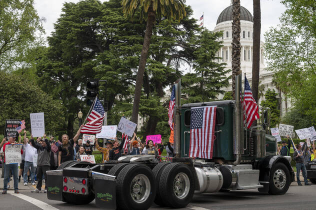 April 21, 2019, Sacramento, California, USA: Demonstrators converged on the California Capitol in Sacramento on Monday, April 20, 2020, to protest the state s stay-at-home orders to slow the spread of the coronavirus. Sacramento USA - ZUMAby1_ 20190421_zap_by1_001 Copyright: xRenÃ exC.xByerx