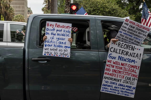 April 21, 2019, Sacramento, California, USA: Demonstrators converged on the California Capitol in Sacramento on Monday, April 20, 2020, to protest the state s stay-at-home orders to slow the spread of the coronavirus. Sacramento USA - ZUMAby1_ 20190421_zap_by1_002 Copyright: xRenÃ exC.xByerx
