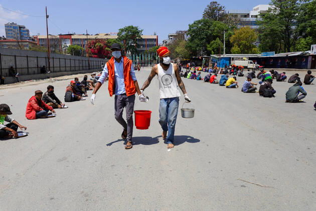 Nepal: Serving food to daily wager laborers The followers of Gorakhnath serve food to the daily wager laborers, during the nationwide lockdown imposed in the wake of Corona virus (COVID-19) Pandemic in Kathmandu, Nepal on April 20, 2020. Kathmandu Bagmati Nepal Copyright: SubashxShrestha