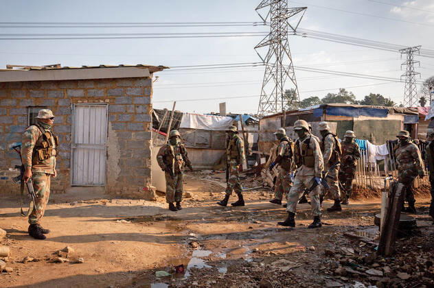 (200421) -- JOHANNESBURG, April 21, 2020 (Xinhua) -- Soldiers of South African National Defense Force patrol in Johannesburg, South Africa, April 20, 2020. South Africa s COVID-19 cases have surged to 3,300, up by 142 from the previous count, Health Minister Zweli Mkhize said Monday. (Photo by Yeshiel Xinhua) SOUTH AFRICA-JOHANNESBURG-COVID-19 