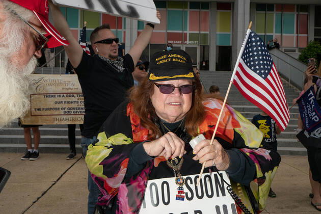 April 21, 2020, Raleigh, NC, USA: ReOpenNC protesters calling for ending or relaxing coronavirus executive orders in Raleigh, NC Tuesday, April 21, 2020. Raleigh USA - ZUMAd43_ 20200421_znp_d43_002 Copyright: xMehmetxDemircix