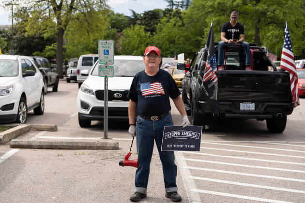 April 20, 2020, Raleigh, NC, USA: ReOpenNC protesters calling for ending or relaxing coronavirus executive orders in Raleigh, NC Tuesday, April 21, 2020. Raleigh USA - ZUMAd43_ 20200420_znp_d43_004 Copyright: xMehmetxDemircix