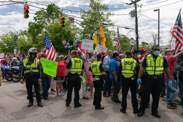 April 21, 2020, Raleigh, NC, USA: ReOpenNC protesters calling for ending or relaxing coronavirus executive orders in Raleigh, NC Tuesday, April 21, 2020. Raleigh USA - ZUMAd43_ 20200421_znp_d43_016 Copyright: xMehmetxDemircix