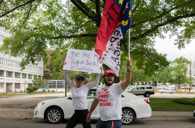 April 21, 2020, Raleigh, NC, USA: ReOpenNC protesters calling for ending or relaxing coronavirus executive orders in Raleigh, NC Tuesday, April 21, 2020. Raleigh USA - ZUMAd43_ 20200421_znp_d43_017 Copyright: xMehmetxDemircix