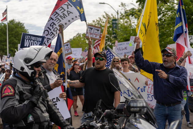April 20, 2020, Raleigh, NC, USA: ReOpenNC protesters calling for ending or relaxing coronavirus executive orders in Raleigh, NC Tuesday, April 21, 2020. Raleigh USA - ZUMAd43_ 20200420_znp_d43_005 Copyright: xMehmetxDemircix