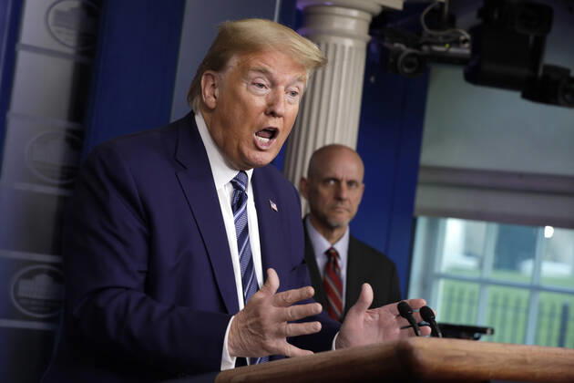 U.S. President Donald Trump arrives at the Coronavirus Task Force press briefing at the White House in Washington on Tuesday, April 21, 2020. The Senate reached a deal on a new Covid-19 relief bill to help businesses and health care providers including testing.  WAX20200421119 YurixGripas