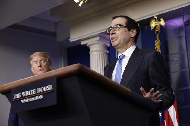 United States Secretary of the Treasury Steven T. Mnuchin speaks next to US President Donald J. Trump during the Coronavirus Task Force press briefing at the White House in Washington on April 21, 2020. Copyright: xGripasx xPoolxviaxCNPx xMediaPunchx