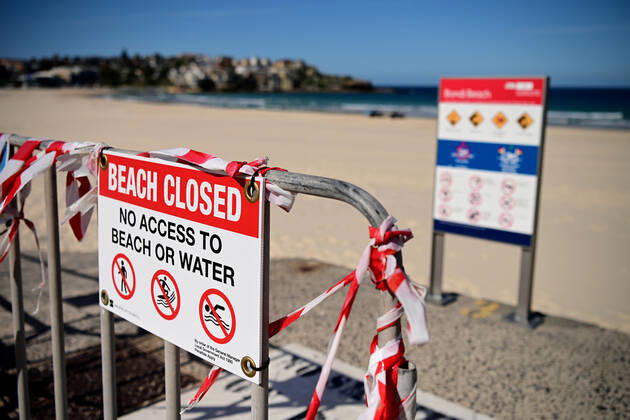 AUSTRALIA CORONAVIRUS BONDI BEACH, Signage at a closed Bondi Beach in Sydney, Wednesday, April 22, 2020. Sydney s iconic Bondi Beach will partially open to swimmers and surfers next week as more beaches in NSW begin easing COVID-19 restrictions.( NO ARCHIVING, EDITORIAL USE ONLY, NO USE IN BOOKS WITHOUT CONSENT SYDNEY NSW AUSTRALIA  Copyright: xJOELxCARRETTx 20200422001464678845