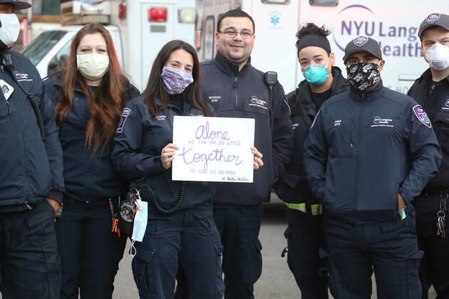 April 21, 2020, New York City, NY, United States: Medical Personal often including doctors, nurses, medical assistants, EMS paramedics, and FDNY firefighters give each other applause for their efforts in caring for COVID-19 or novel Coronavirus patients, at 7 pm everyday at NYU Langone Medical Center on First avenue. New York City United States - ZUMAh16_ 20200421_zaf_h16_033 Copyright: xDanxHerrickx
