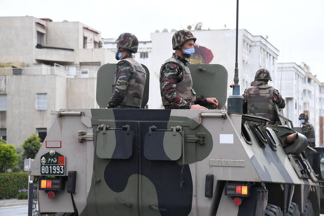 (200422) -- RABAT, April 22, 2020 -- Soldiers wearing masks are seen on military vehicles in Rabat, Morocco, April 21, 2020. Morocco has extended the state of medical emergency until May 20, in order to strengthen preventive measures to combat the spread of the novel coronavirus. (Photo by Xinhua) MOROCCO-RABAT-COVID-19-MEDICAL EMERGENCY Chadi 