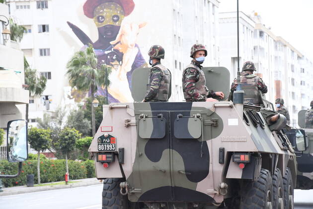 (200422) -- RABAT, April 22, 2020 -- Soldiers wearing masks are seen on military vehicles in Rabat, Morocco, April 21, 2020. Morocco has extended the state of medical emergency until May 20, in order to strengthen preventive measures to combat the spread of the novel coronavirus. (Photo by Xinhua) MOROCCO-RABAT-COVID-19-MEDICAL EMERGENCY Chadi 