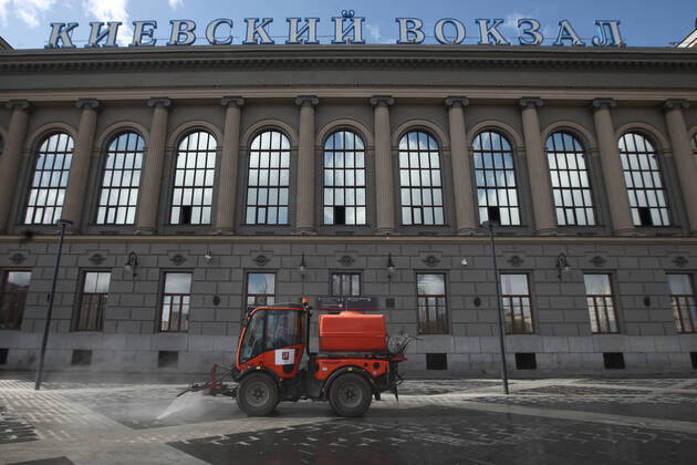 MOSCOW, RUSSIA - APRIL 22, 2020: A street sweeper washes pavements outside Kiyevsky railway station amid the ongoing COVID-19 pandemic. Sergei Fadeichev TASS  TS0D6A86