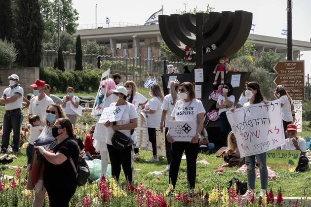 April 22, 2020, Jerusalem, Israel: Self employed teachers and caretakers of privately run preschool establishments protest outside the Israeli parliament demanding government financial assistance in light of the Coronavirus outbreak and lockdown leaving them with rent and taxes to pay but no income. Jerusalem Israel - ZUMAa126 20200422_zap_a126_008 Copyright: xNirxAlonx