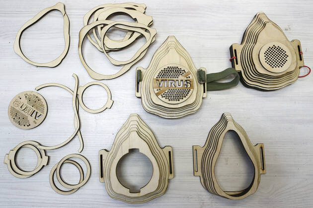 TATARSTAN, RUSSIA - APRIL 22, 2020: This image shows parts of the reusable plywood respirator invented by Radik Guryev, a teacher at an arts and crafts centre for children and youth in the town of Mamadysh, Tatarstan, amid a shortage of conventional face masks during the pandemic of the novel coronavirus disease (COVID-19). The respirator includes a replaceable cotton pad filter. Yegor Aleyev TASS  TS0D6AA0