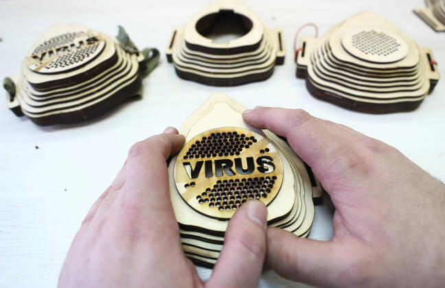TATARSTAN, RUSSIA - APRIL 22, 2020: Radik Guryev, a teacher at an arts and crafts centre for children and youth in the town of Mamadysh, Tatarstan, shows how to assemble a reusable plywood respirator that he invented amid a shortage of conventional face masks during the pandemic of the novel coronavirus disease (COVID-19). The respirator includes a replaceable cotton pad filter. Yegor Aleyev TASS  TS0D6AA8