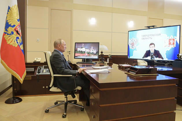 MOSCOW REGION, RUSSIA - APRIL 22, 2020: Russia s President Vladimir Putin holds a meeting with Sverdlovsk Region Governor Yevgeny Kuivashev via video link from Novo-Ogarevo residence. Alexei Druzhinin Russian Presidential Press and Information Office TASS  TS0D6AE7