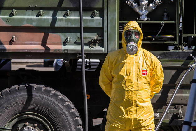 April 22, 2020, Neubiberg Bei Muenchen, Bavaria, Germany: German Bundeswehr soldiers wear gas masks and Dupint TyChem C protective clothing while mixing the constituents together to make Oxicide, a surface disinfectant used in the fight against Coronavirus. At the Bundeswehr Universitaet (Military University of Germany) in Neubiberg near Munich, Bavarian Interior Minister Joachim Herrmann, Generalleutnant Martin Schelleis, dem Nationalen Territorialen Befehlshaber und Inspekteur der Streitkro¤ftebasis, as well as members of the Technisches Hilfswerk (Federal Agency for Technical Relief) were on hand to explain the effort and coordination of the production of large amounts of surface disinfectants used to help in the fight against SARS-CoV-2 Coronavirus. Germany is currently at 148,174 positive diagnoses with 4,961 deaths. Neubiberg Be - ZUMAb160 20200422_zbp_b160_034 Copyright: xSachellexBabbarx