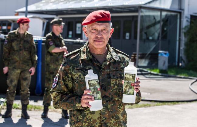 April 22, 2020, Neubiberg Bei Muenchen, Bavaria, Germany: At the Bundeswehr Universitaet (Military University of Germany) in Neubiberg near Munich, Bavarian Interior Minister Joachim Herrmann, Generalleutnant Martin Schelleis, dem Nationalen Territorialen Befehlshaber und Inspekteur der Streitkro¤ftebasis, as well as members of the Technisches Hilfswerk (Federal Agency for Technical Relief) were on hand to explain the effort and coordination of the production of large amounts of surface disinfectants used to help in the fight against SARS-CoV-2 Coronavirus. Germany is currently at 148,174 positive diagnoses with 4,961 deaths. Neubiberg Bei Muenchen Germany - ZUMAb160 20200422_zbp_b160_067 Copyright: xSachellexBabbarx