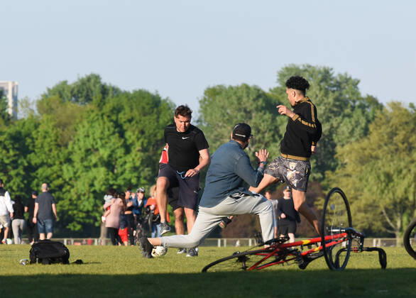 . 22 04 2020. London, United Kingdom. Coronavirus crisis. A group of people seen playing football at Burguess Park this afternoon, as the coronavirus lockdown continues.  xGustavoxValientex xi-Imagesx IIM-21051-0043
