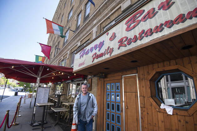 John Boyle stands outside his popular Harry s Bar and Restaurant that is closed in downtown Washington, DC on Wednesday, April 22, 2020. Office buildings, retail stores and restaurants are essentially closed downtown in the Nation s Capital due to COVID-19. Depending on how long the shutdown will last, some say 30% to 50% of the DC restaurants and bars will not be able to reopen.  WAS20200422081 PATxBENIC