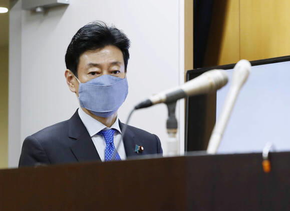 New coronavirus Japanese economic revitalization minister Yasutoshi Nishimura speaks at a press conference in Tokyo on April 22, 2020, after holding talks with Tokyo Gov. Yuriko Koike over the coronavirus pandemic. 
