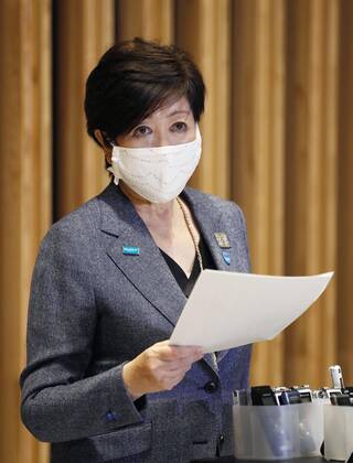 New coronavirus Tokyo Gov. Yuriko Koike speaks to reporters in Tokyo on April 22, 2020, after holding talks with economic revitalization minister Yasutoshi Nishimura over the coronavirus pandemic. 