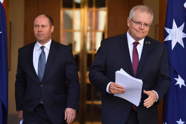 SCOTT MORRISON CORONAVIRUS UPDATE, Treasurer Josh Frydenberg and Prime Minister Scott Morrison arrive at a press conference in Canberra, Thursday, April 23, 2020. ( NO ARCHIVING, EDITORIAL USE ONLY, NO USE IN BOOKS WITHOUT CONSENT Canberra ACT AUSTRALIA  Copyright: xMICKxTSIKASx 20200423001464850311