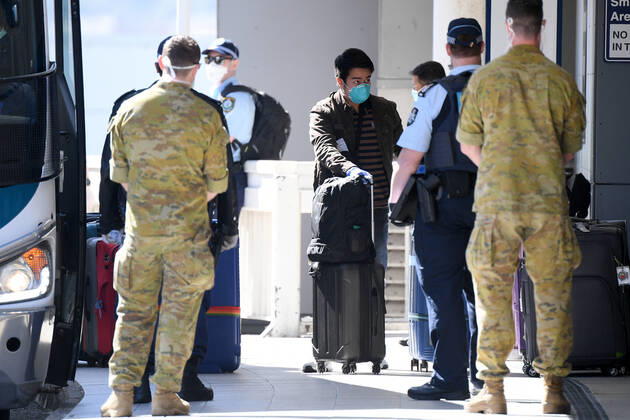 RUBY PRINCESS DEPARTURE, Crew from the Ruby Princess cruise ship are seen arriving at Sydney International Airport in Sydney, Thursday, April 23, 2020. The Ruby Princess cruise ship has been told to leave Australia by Thursday, as an inquiry begins. ( NO ARCHIVING, EDITORIAL USE ONLY, NO USE IN BOOKS WITHOUT CONSENT SYDNEY NSW AUSTRALIA  Copyright: xDANxHIMBRECHTSx 20200423001464855095