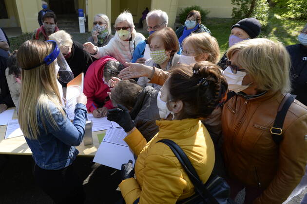 People register to take a sample for a covid-19 test, on April 23, 2020, in Prague, Czech Republic. Across-the-board testing of population for new coronavirus began today. Test points open in Prague at 10:00, in Brno and Litomerice at 8:00. The goal is to find out the presence of coronavirus in Czech population. (CTKxPhoto KaterinaxSulova) CTKPhotoP202004230293401 _SUK6685