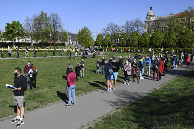 People waiting queue to take a sample for a covid-19 test, on April 23, 2020, in Zitek Gardens, Prague, Czech Republic. Across-the-board testing of population for new coronavirus began today. Test points open in Prague at 10:00, in Brno and Litomerice at 8:00. The goal is to find out the presence of coronavirus in Czech population. (CTKxPhoto MichalxKamaryt) CTKPhotoP202004230319801 kmt 4
