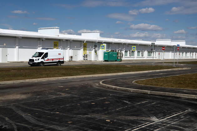 MOSCOW, RUSSIA - APRIL 23, 2020: An ambulance car outside Demikhov city hospital No 68; a new 800-bed infectious disease centre in the village of Voronovskoye was built within a month using pre-fabricated structures; after the COVID-19 pandemic, the centre will deal with all types of infectious diseases. Valery Sharifulin TASS  TS0D6C67