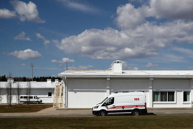 MOSCOW, RUSSIA - APRIL 23, 2020: An ambulance car outside Demikhov city hospital No 68; a new 800-bed infectious disease centre in the village of Voronovskoye was built within a month using pre-fabricated structures; after the COVID-19 pandemic, the centre will deal with all types of infectious diseases. Valery Sharifulin TASS  TS0D6C68