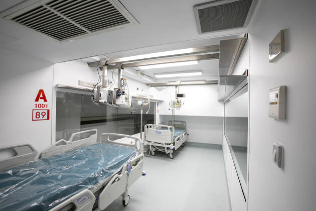 A two-bed intensive care unit within a shipping container has been built at a hospital in Turin and is being used to treat patients fighting the coronavirus. Named Connected Units for Respiratory Ailments (CURA), the intensive care pod was designed by Italian architects Carlo Ratti and Italo Rota to increase intensive care unit (ICU) capacity in northern Italy. The pod, which contains two beds, has been installed at a temporary hospital built within the Officine Grandi Riparazioni complex in central Turin. The first patient was admitted earlier this week on 19 April. Built within a 6.1-metre-long shipping container, the intensive care pod contains beds and facilities including ventilators, monitors, intravenous fluid stands and syringe drivers for two patients. Ratti believes that the shipping-container pods combine the benef Copyright: xx 40462607 EDITORIAL USE ONLY. NOT FOR USE BY NEWSPAPERS BASED IN THE UK.