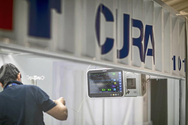 A two-bed intensive care unit within a shipping container has been built at a hospital in Turin and is being used to treat patients fighting the coronavirus. Named Connected Units for Respiratory Ailments (CURA), the intensive care pod was designed by Italian architects Carlo Ratti and Italo Rota to increase intensive care unit (ICU) capacity in northern Italy. The pod, which contains two beds, has been installed at a temporary hospital built within the Officine Grandi Riparazioni complex in central Turin. The first patient was admitted earlier this week on 19 April. Built within a 6.1-metre-long shipping container, the intensive care pod contains beds and facilities including ventilators, monitors, intravenous fluid stands and syringe drivers for two patients. Ratti believes that the shipping-container pods combine the benef Copyright: xx 40462608 EDITORIAL USE ONLY. NOT FOR USE BY NEWSPAPERS BASED IN THE UK.