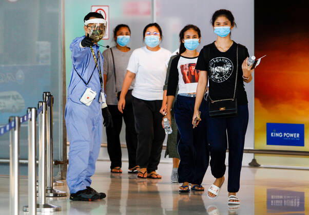 April 23, 2020, Bangkok, Thailand: Passengers arrive at the Suvarnabhumi Airport while wearing face masks as a preventive measure during the Coronavirus (COVID-19) crisis..Thailand has so far reported 2,839 cases of COVID-19 coronavirus with most of the cases reported in the Capital city of Bangkok. Bangkok Thailand - ZUMAs197 20200423_zaa_s197_016 Copyright: xChaiwatxSubprasomx
