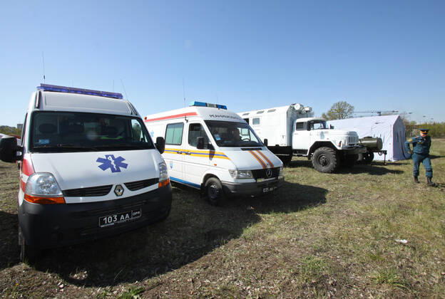 DONETSK, UKRAINE - APRIL 23, 2020: Ambulance cars at a field hospital for coronavirus patients, which was set up by servicemen of the Emergency Situations Ministry of the Donetsk People s Republic as part of a COVID-19 response exercise; the exercise is aimed at providing a timely and efficient professional medical assistance to victims of emergencies in case of a lack of beds in hospitals. A similar field hospital can admit over 100 people. Valentin Sprinchak TASS  TS0D6D3D